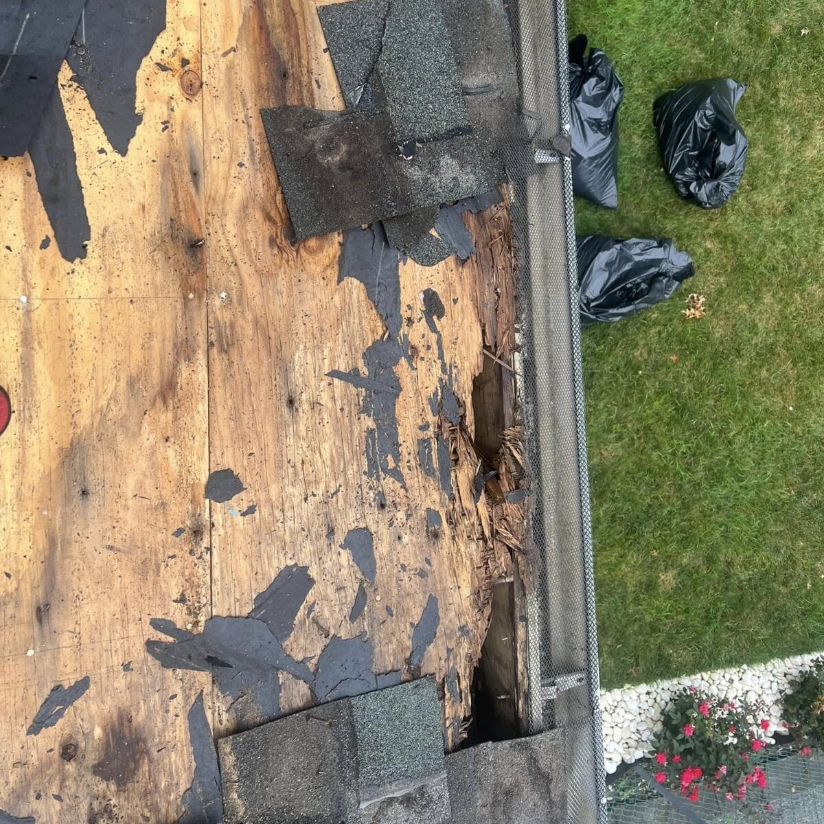 Severely rotted roof decking found during tear off water damage NJ