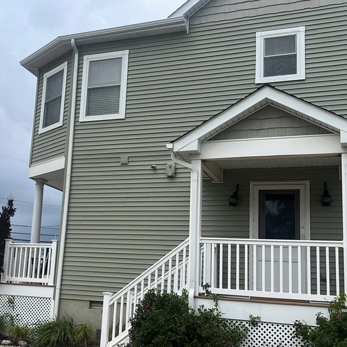 Completed roof sage green Jersey Shore home front view NJ