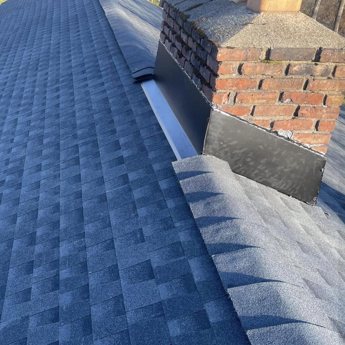 Roof ridge new gray architectural shingles NJ