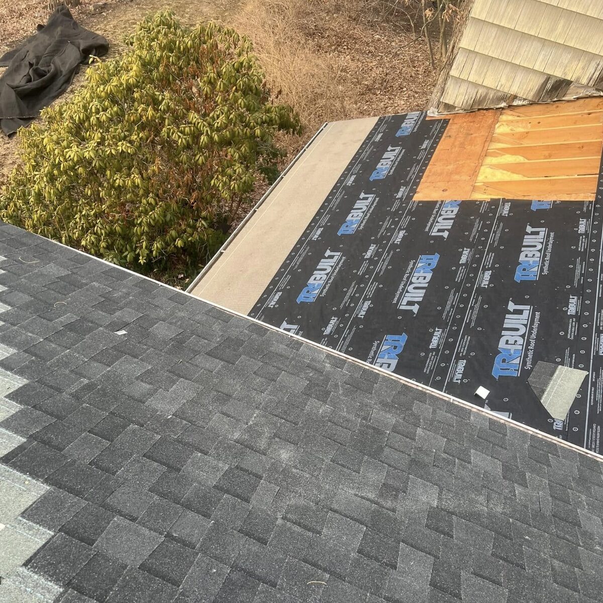 Finished roof valley gray shingles aerial NJ