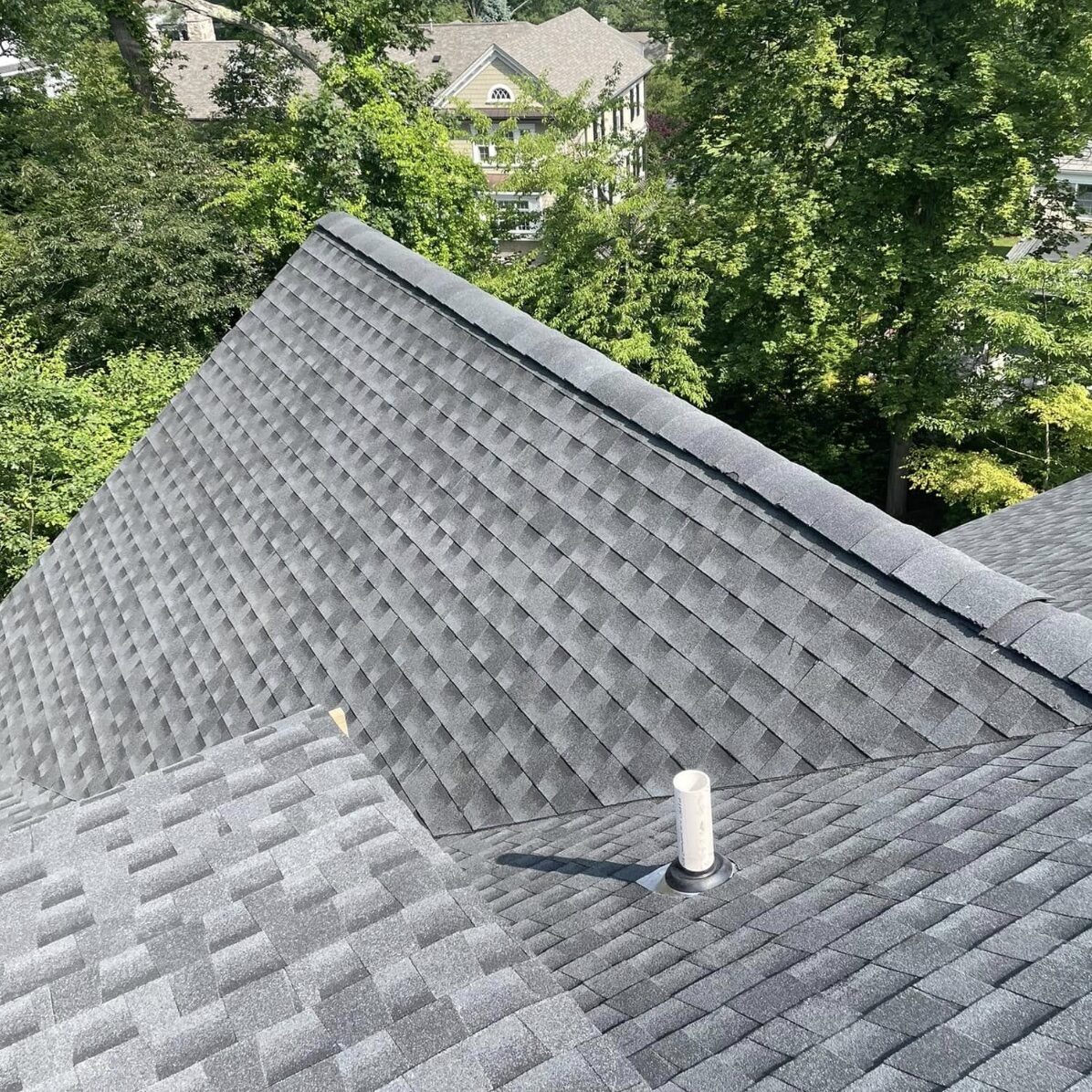 Finished gray shingle roof aerial vent pipe NJ