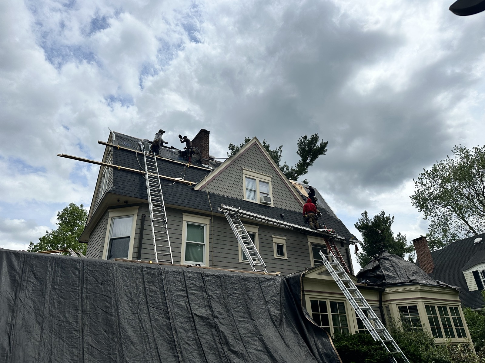 Victorian home full roof tear off crew ladders tarp protection NJ