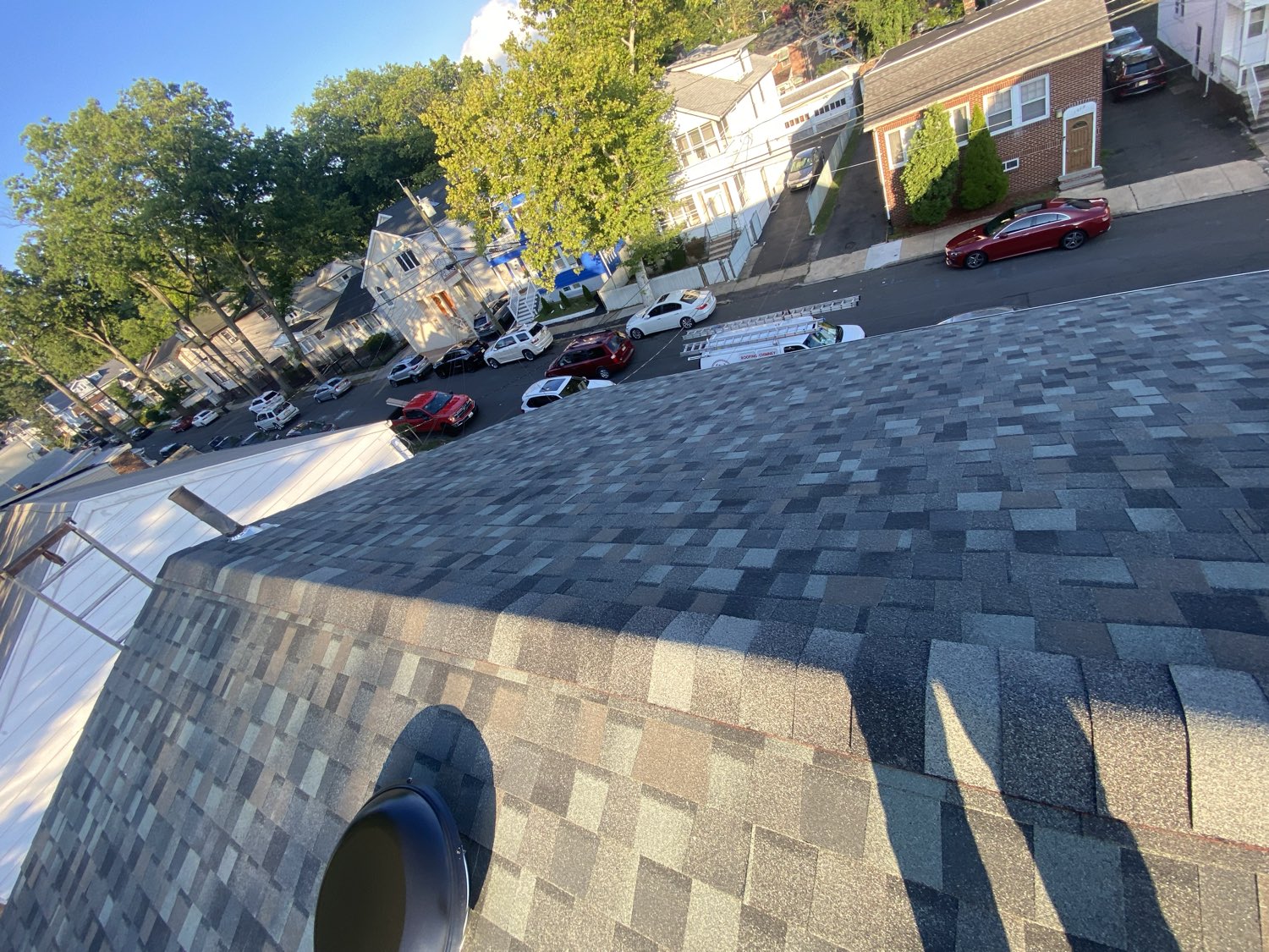 Rooftop view new shingles over neighborhood NJ
