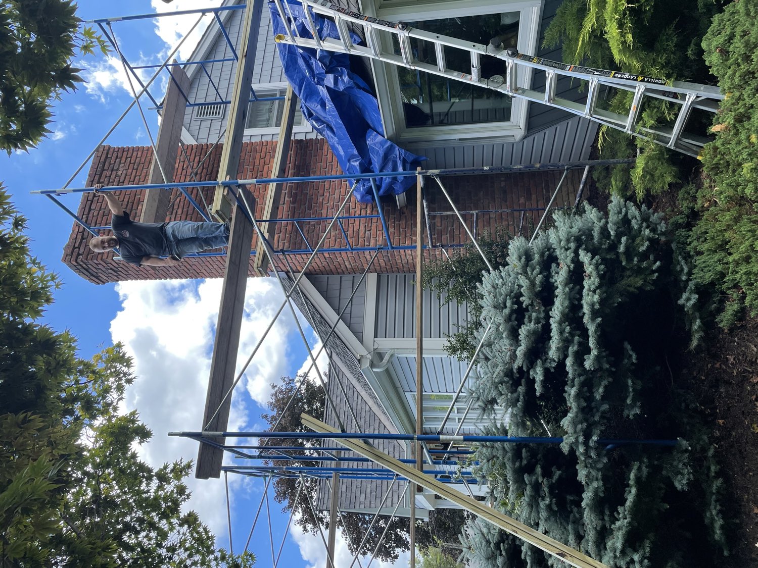 Chimney rebuild scaffolding set brick work in progress NJ