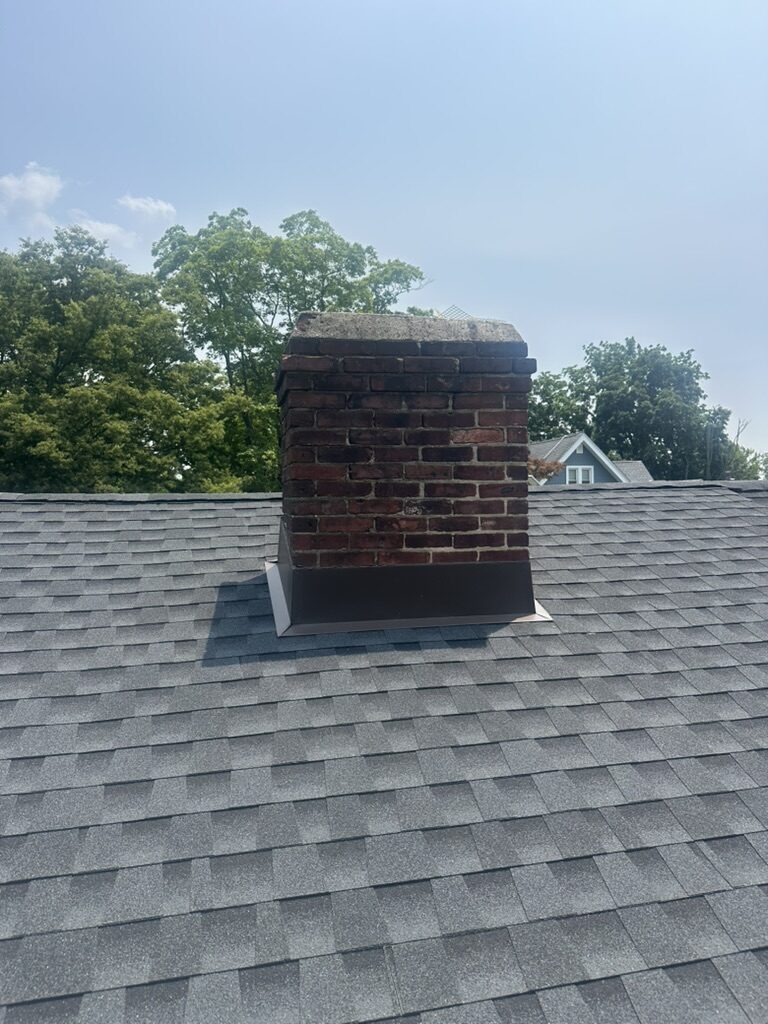 Deteriorated chimney before rebuild worn crown no cap NJ