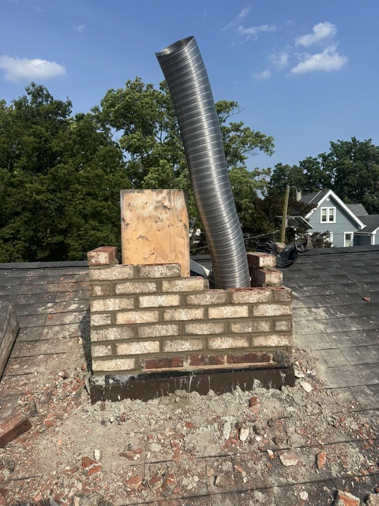 Stainless steel flexible chimney liner install mid progress NJ